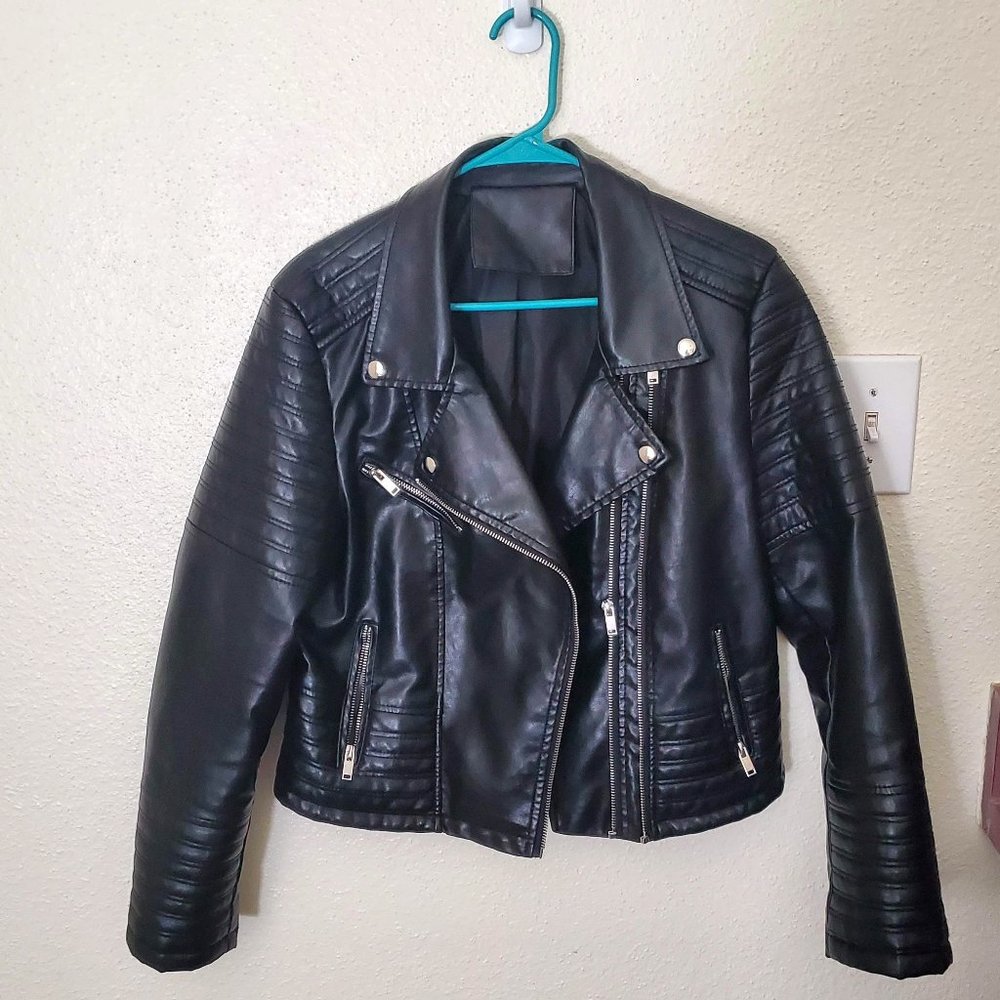 This piece is a black leather jacket from Shein. Size large.